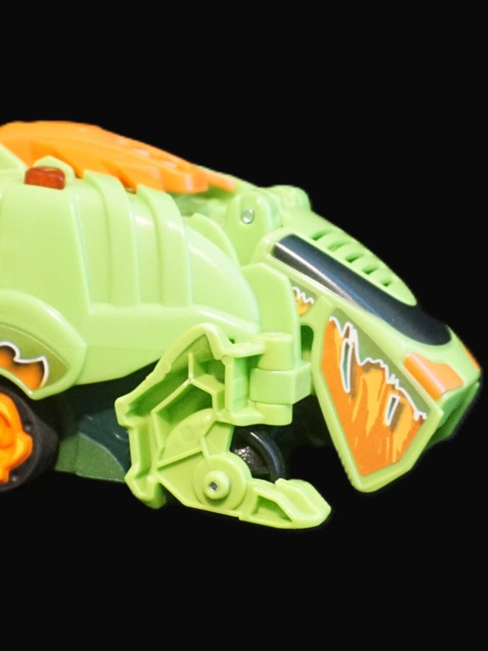 V Tech Switch and Go Dino Green and Orange Turbo Spur Stegosaurus Dinosaur